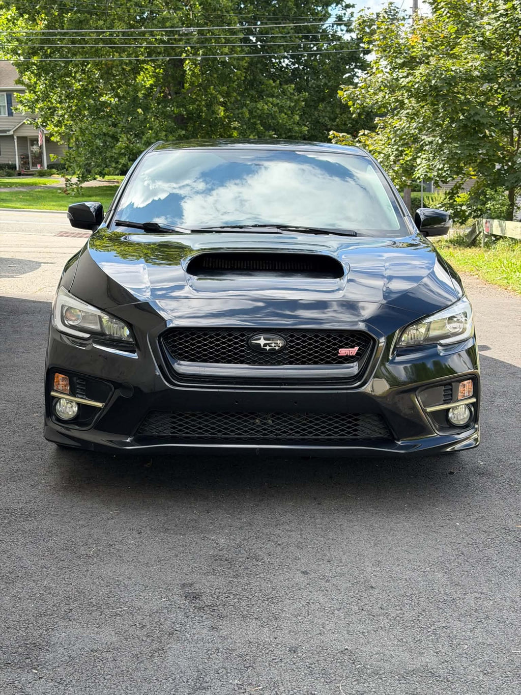 2016 Subaru WRX STI front view in black, for sale