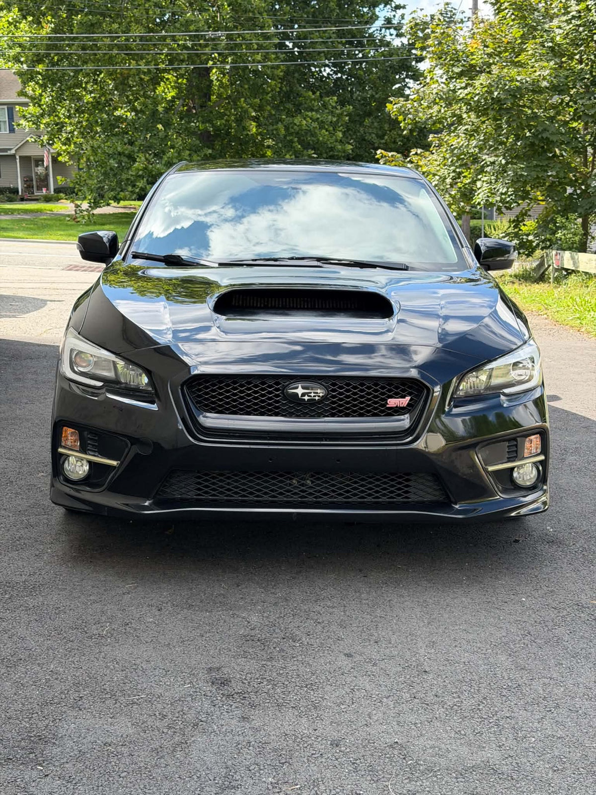 2016 Subaru WRX STI front view in black, for sale