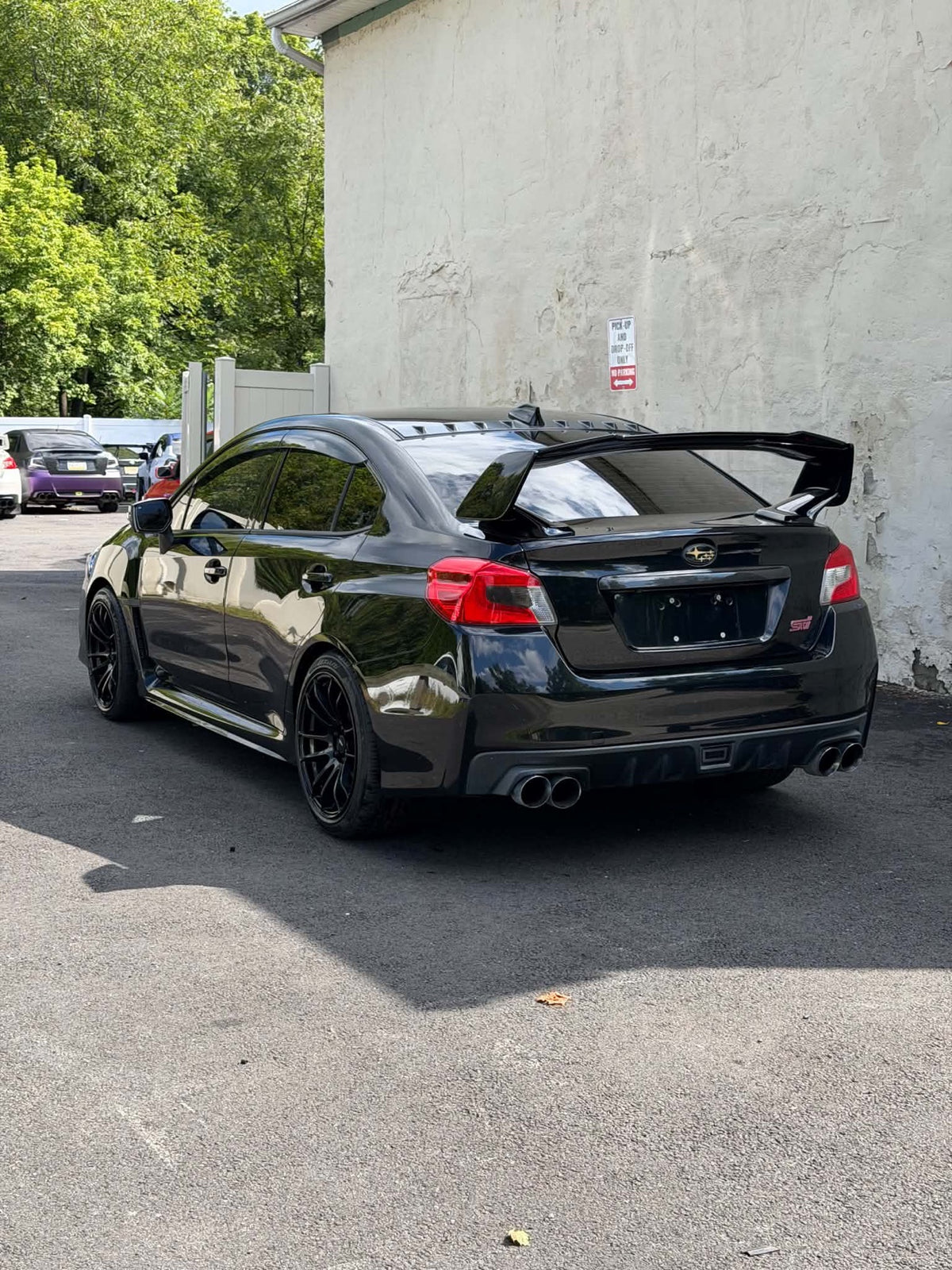 2016 Subaru WRX STI rear three-quarter view with GT wing, for sale