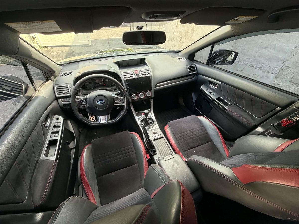 2016 Subaru WRX STI interior cockpit with black and red sport seats, for sale