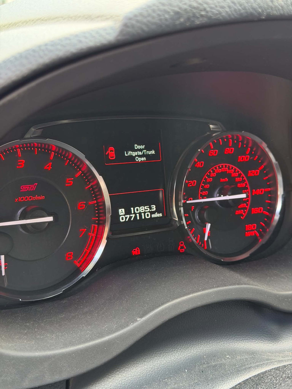 2016 Subaru WRX STI odometer showing 77,110 miles, for sale
