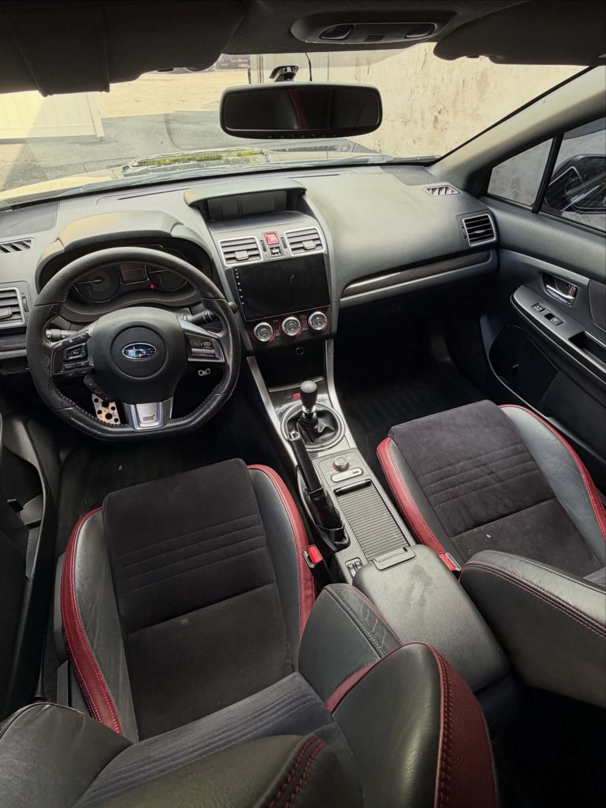 2016 Subaru WRX STI interior cockpit with black and red sport seats, for sale
