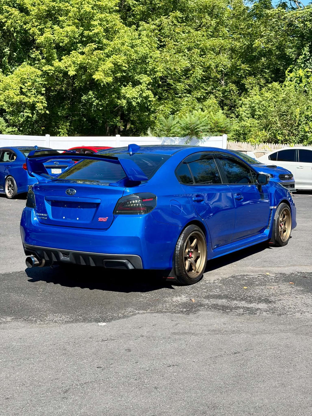 2019 Subaru WRX STI rear three-quarter view in blue, for sale