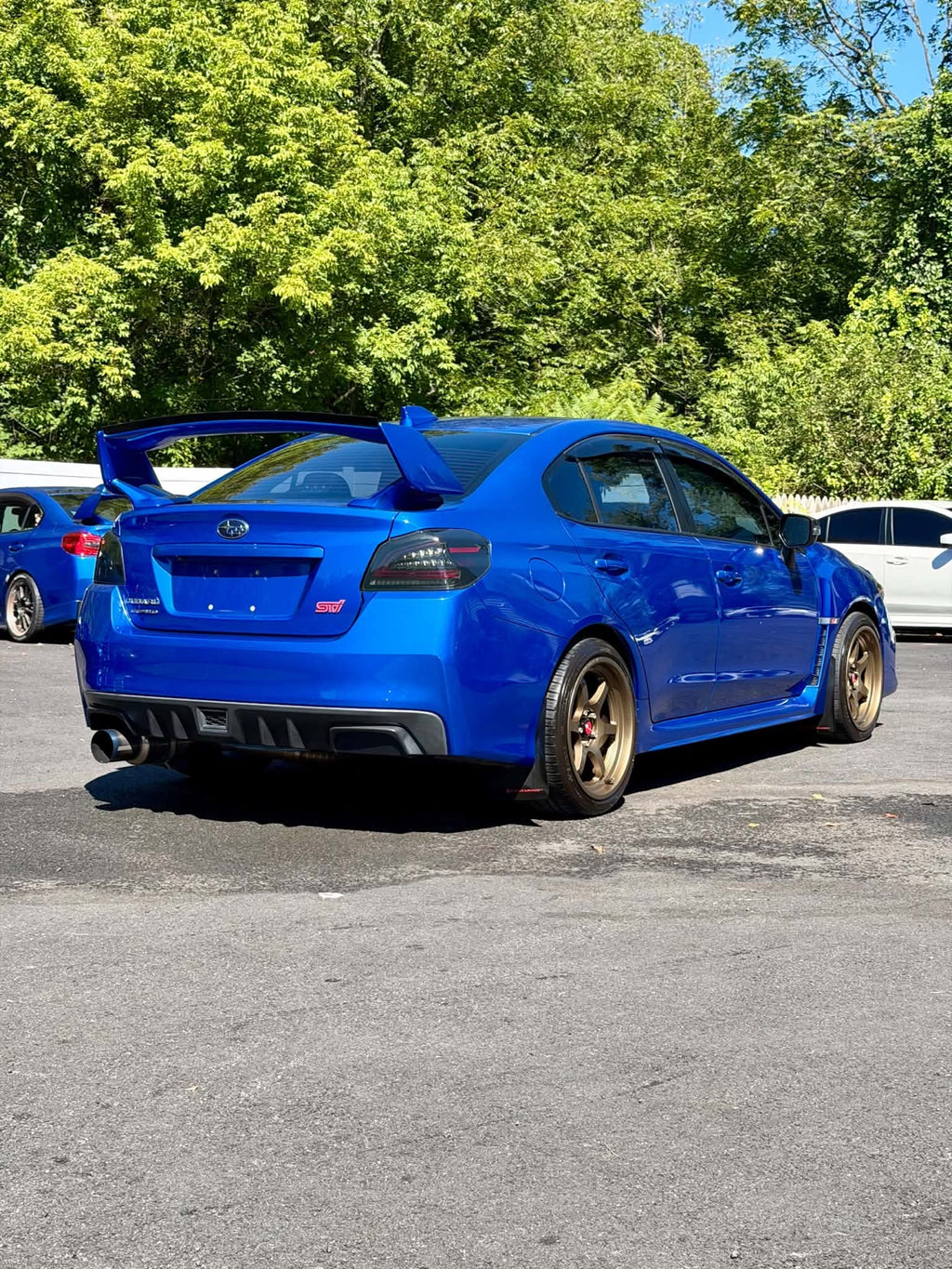 2019 Subaru WRX STI rear three-quarter view in blue, for sale