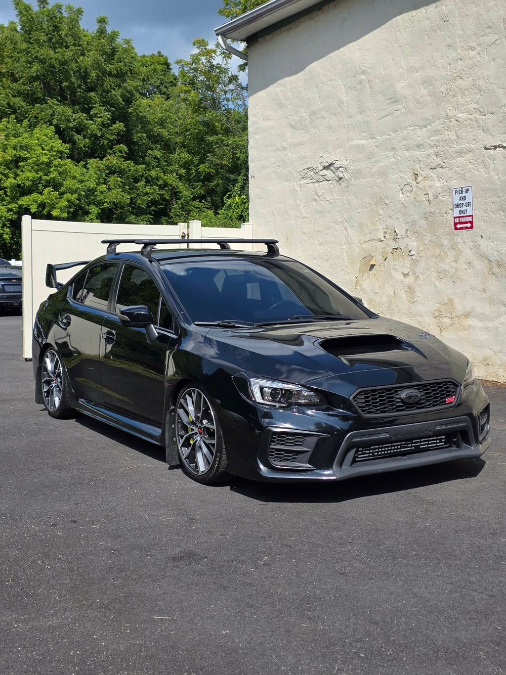 2020 Subaru WRX STI front three-quarter view in black, for sale