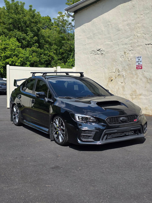 2020 Subaru WRX STI front three-quarter view in black, for sale
