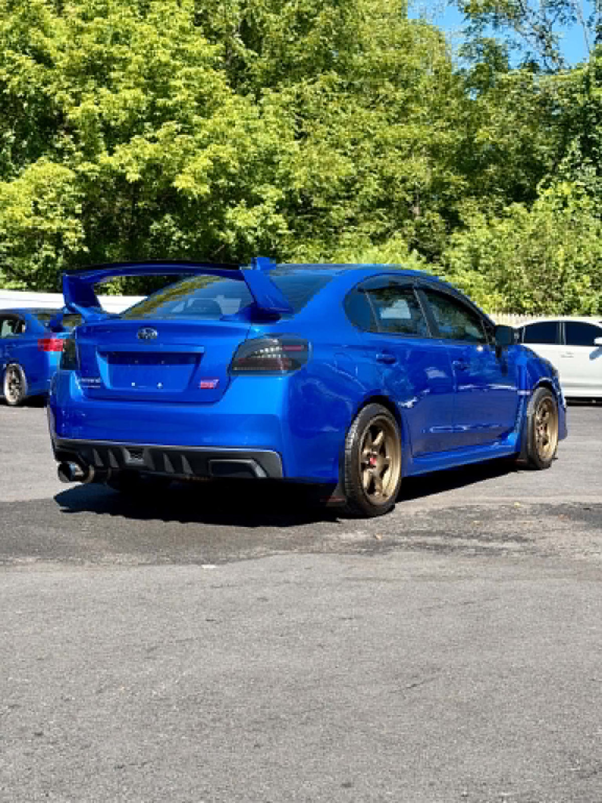 2019 Subaru WRX STI rear three-quarter view in blue, for sale