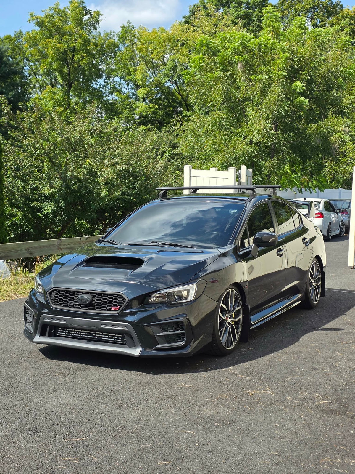 2020 Subaru WRX STI front three-quarter view in black, for sale